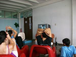 Medical students watching the news at the Latin American School of Medicine (ELAM).