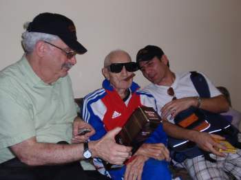 Marrero in his Havana apartment with Kit Krieger (L) and translator Clem Axel (R) weeks short of his centennial. Photo by Peter C. Bjarkman