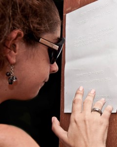 At the entrance to the cinema is the billboard written in Braille for people who are blind. Photo: Raquel Perez